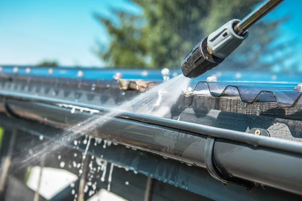 How to Clean Gutters Without Climbing a Ladder